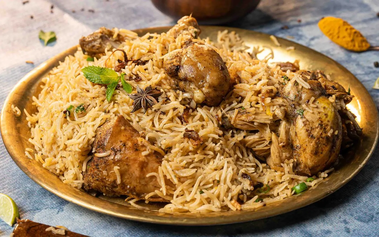 Chicken biryani presented on a brass plate (illustrative photo)