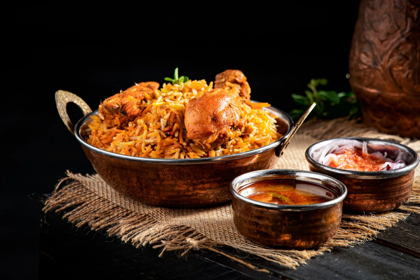 Chicken biryani in a copper handi with salan for an Indian wedding buffet (illustrative photo)